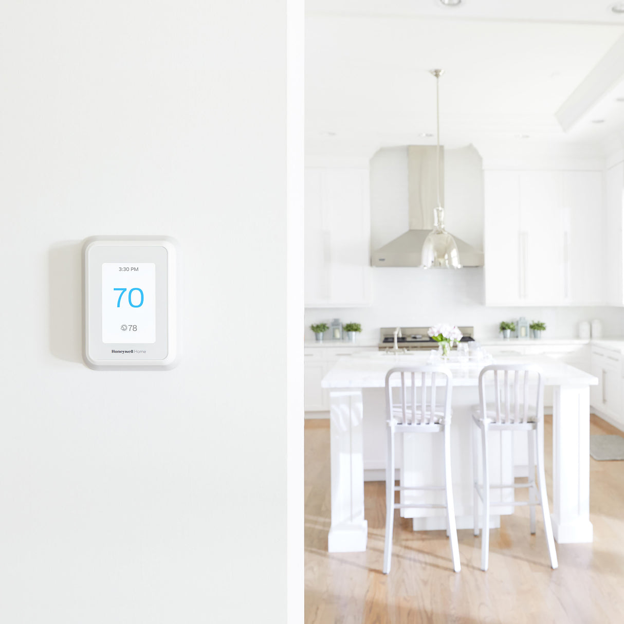 SkuImg;RCHT9510WFW2001/U;RCHT9610_Lifesyle-c15-6.jpg;WiFi Smart Thermostat with Room Sensor in living room